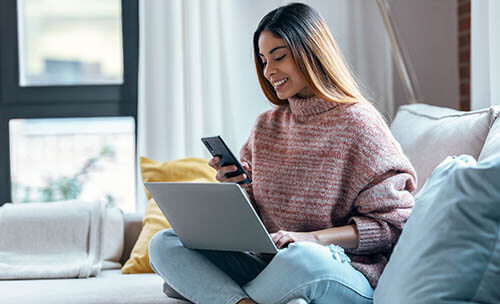 Woman Using Her Laptop Computer